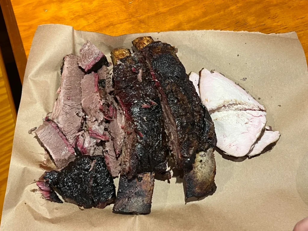 A serving of Black’s brisket and giant beef rib. Credit: u/Beneficial-Stable-66 via r/BBQ