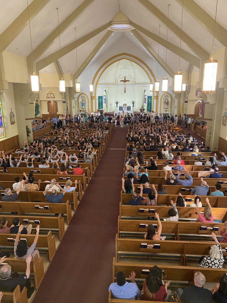 Students and their families, school staff, and faculty attend mass held at the Saints Peter and Paul Parish. Credit: Sts. Peter and Paul Catholic School via Facebook