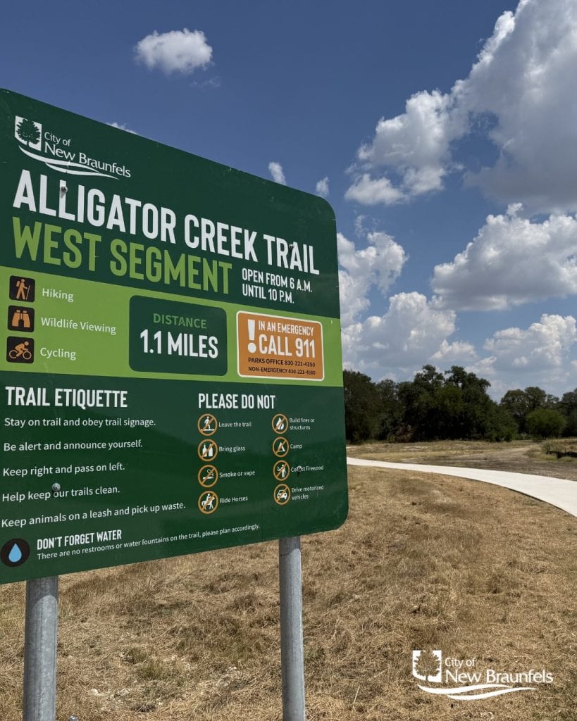 The Alligator Creek Trail sign provides key information for hikers, including trail length, difficulty, and safety tips. Credit: @cityofnbtx via Instagram