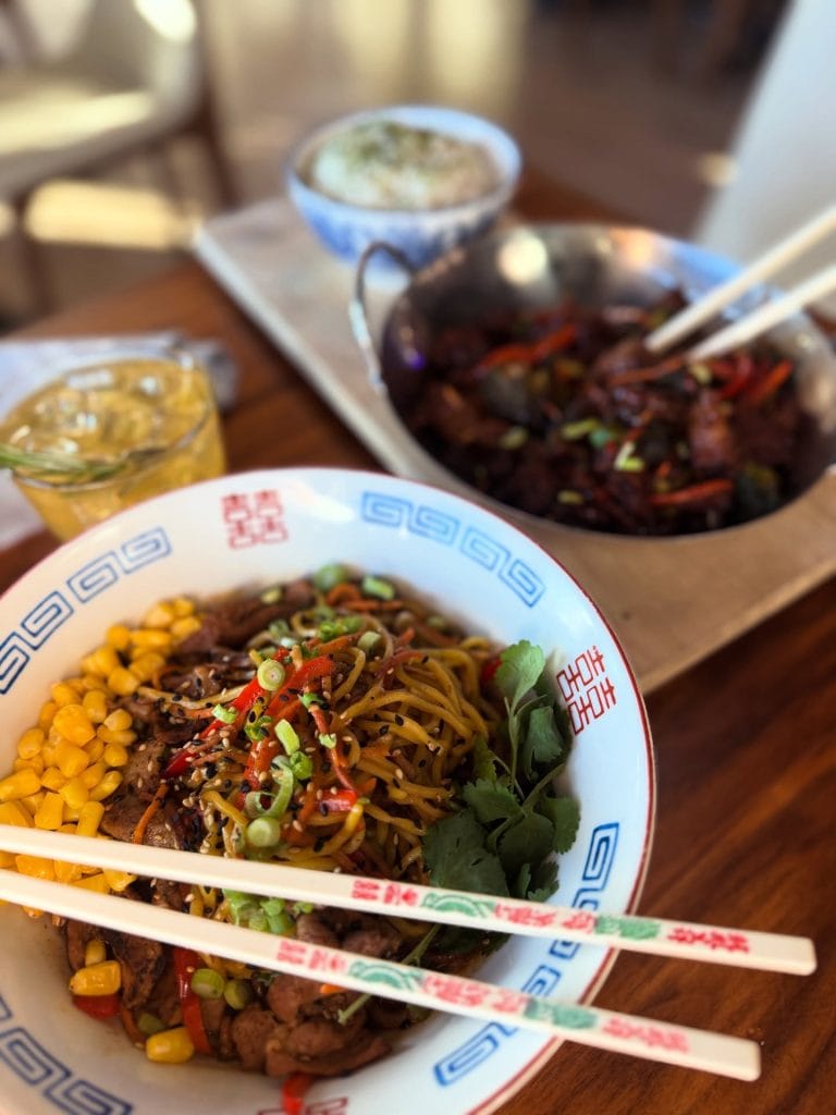 BBQ pork lo mein is a popular favorite at Delicious Garden, known for its comforting Chinese dishes. Credit: @cowa.sake via Instagram