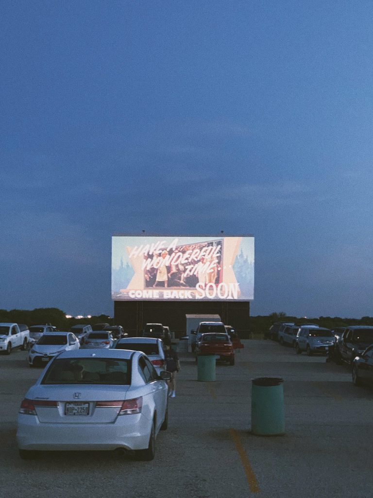 Guests settle into their parking spots as the big screen lights up at Stars & Stripes Drive-In Theatre. Credit: u/graciexlc via r/sanantonio