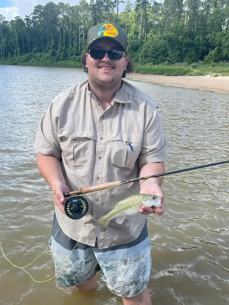 Casting a 5-weight and pulling in a small bass… just another good day on Texas waters. Credit: u/v3c7r0c17y via r/flyfishing