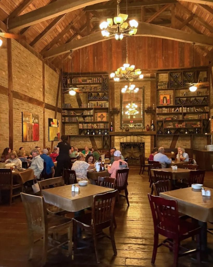 Gruene River Grill: cozy dining with a touch of vintage charm. Credit: @gruenerivergrill via Instagram
