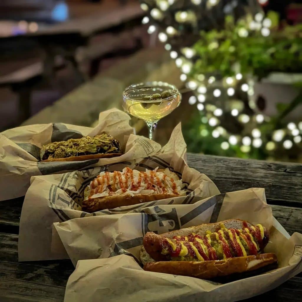 Wurst in Gruene serves up flavorful sausage sandwiches that are a must-try for any visitor. Credit: @wurstingruene via Instagram
