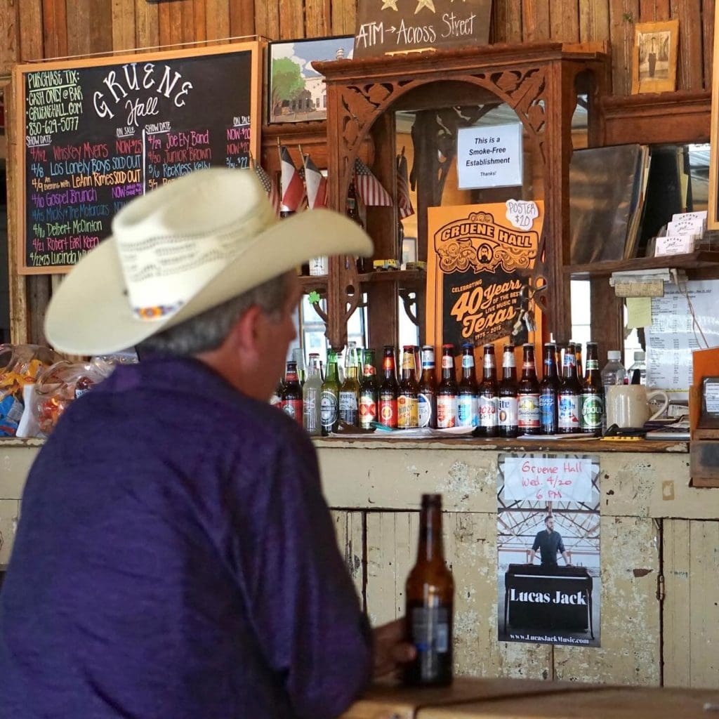 Gruene Hall’s bar, a perfect spot to enjoy drinks and live music. Credit: @gruenehall via Instagram