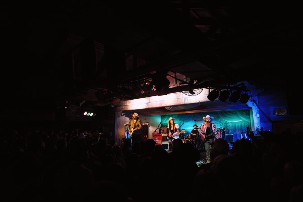The Lowdown Drifters take the stage at a packed Gruene Hall, bringing live Texas music to life. Credit: @thelowdowndrifters via Instagram