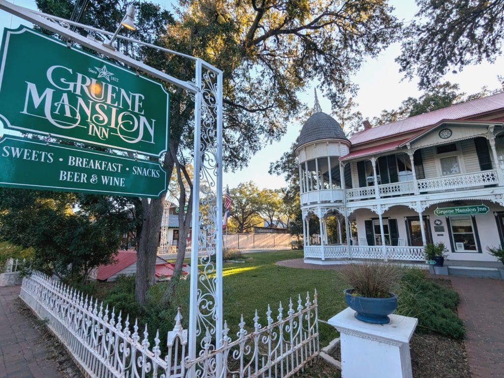 The iconic facade of Gruene Mansion Inn, a historic stay in the heart of Gruene since 1872. Credit: Steve Jones via Facebook