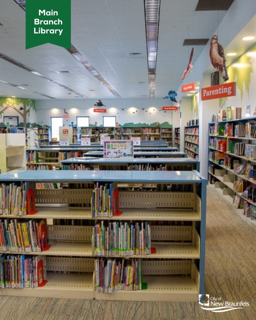 Themed sections line the shelves at the New Braunfels Public Library, inviting visitors to browse and linger. Credit: @nbpltx via Instagram