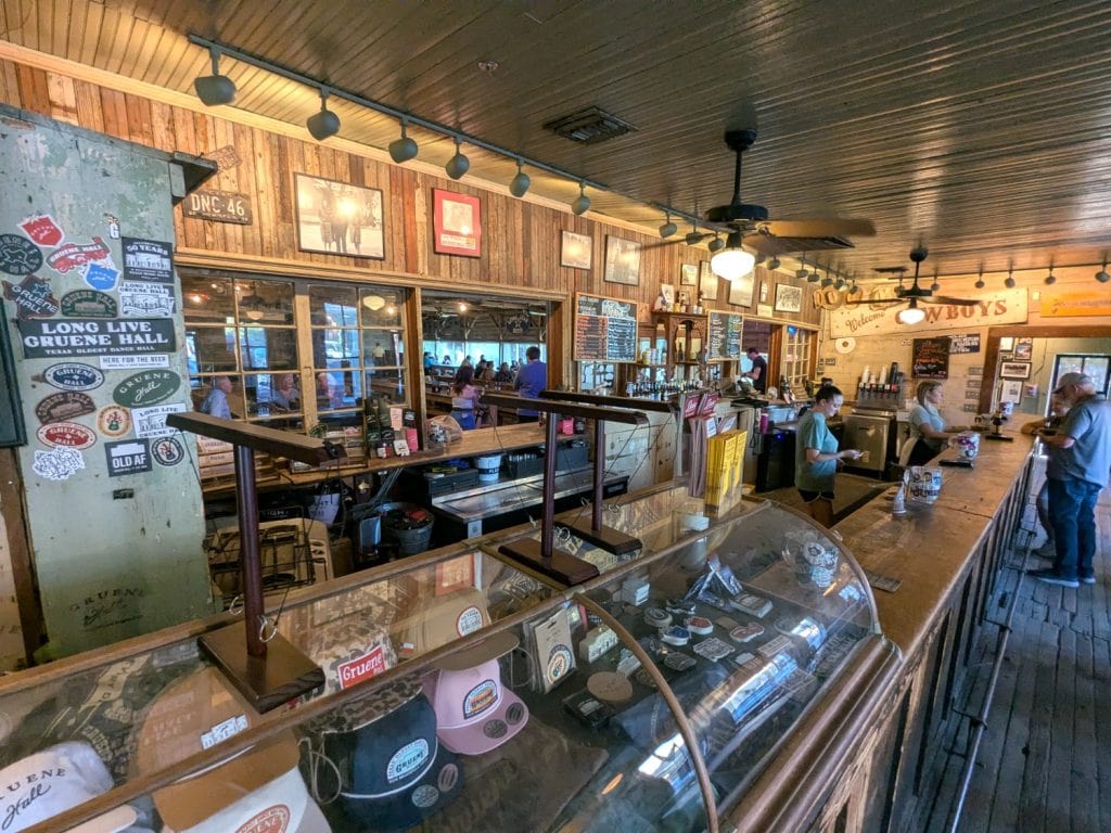 Gruene Hall’s interior showcases its rich history, with displays and architecture that have stood the test of time. Credit: Steve Jones via Facebook