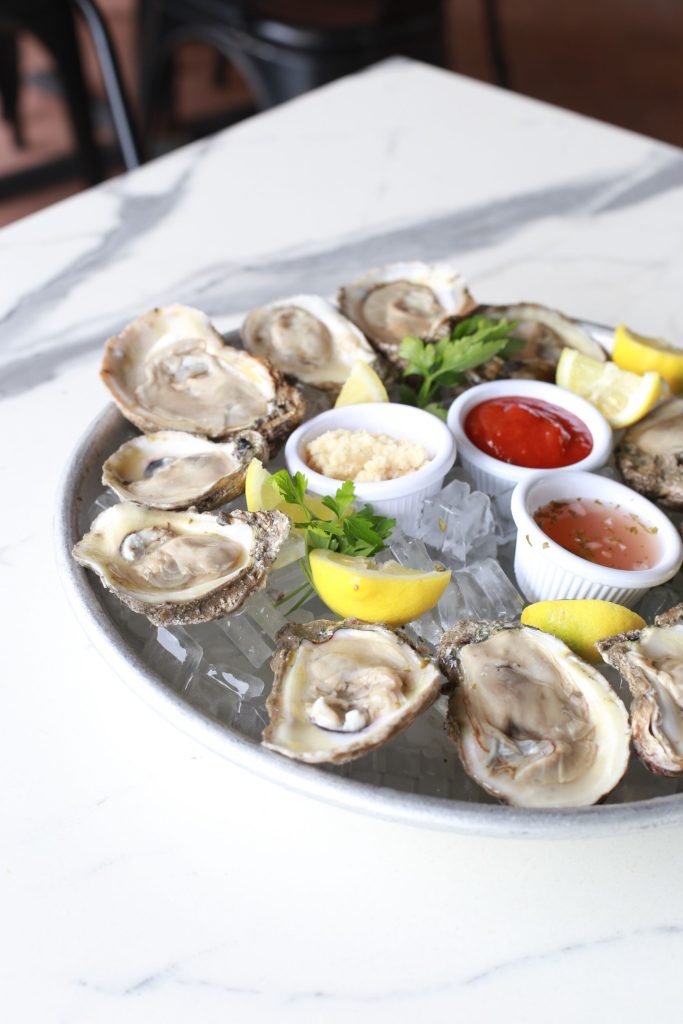 Fresh oysters on ice, served up at The Reel Seafood & Grill. Credit: @thereelgrill via Instagram