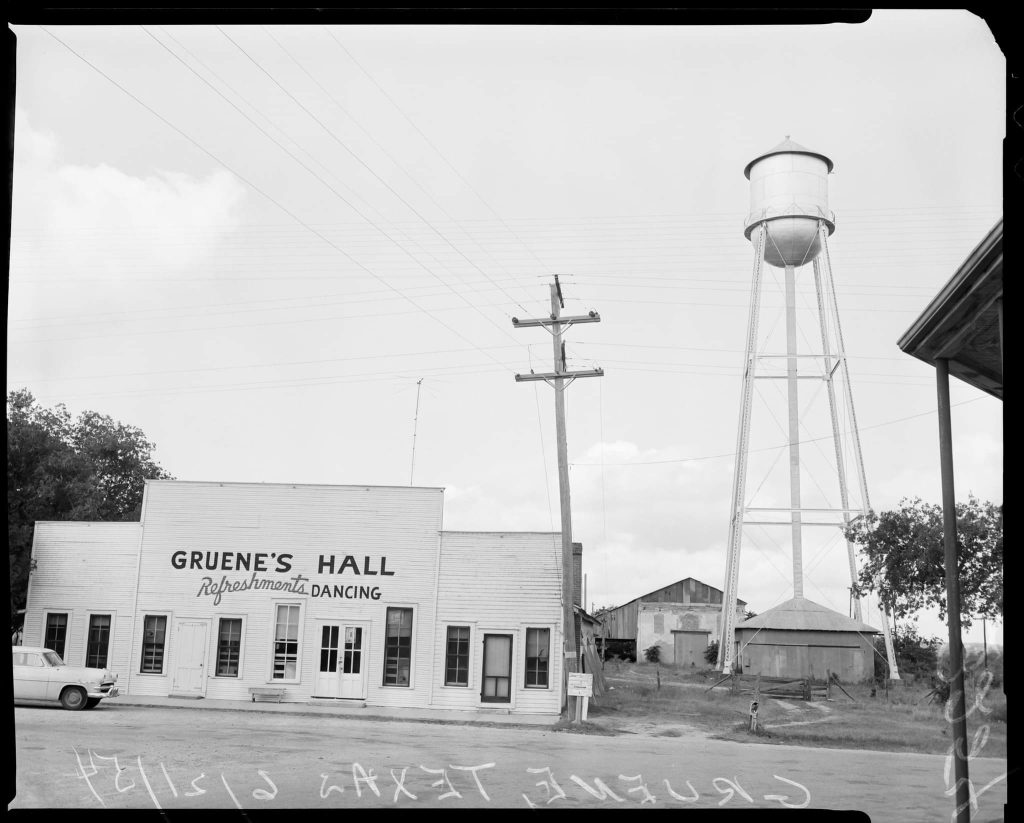 A 1954 view of Gruene Hall and the Gristmill, historic landmarks that helped shape Gruene district’s legacy. Credit: Reddit contributor via r/Newbraunfels