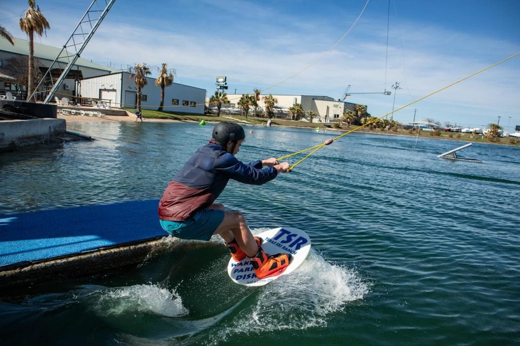 Catch the thrill! Wakeboarding is just one of the adrenaline-packed activities at Texas Ski Ranch. Credit: @texasskiranch via Instagram