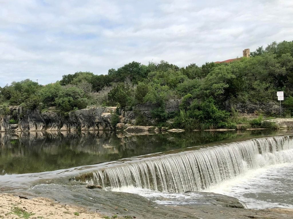 Blue Hole in Georgetown, Texas—a scenic section of the South San Gabriel River—forms a calm swimming and wading spot surrounded by limestone cliffs and trees. Credit: Melissa Ramey via Facebook
