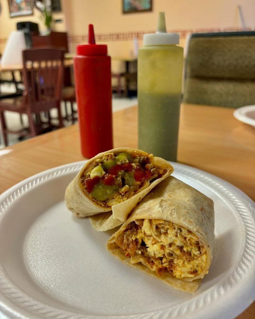 The chorizo breakfast burrito at Rayo’s Taqueria did not disappoint—packed with flavor and perfect for starting the day. Credit: @globalfoodduo via Instagram