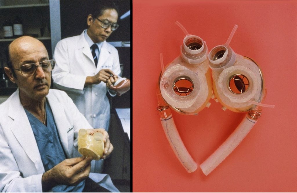 Dr. Denton Cooley with a total artificial heart in 1981, marking his second successful implantation, keeping a patient alive for 55 hours until a donor heart was found. Credit: @texasheartinstitute via Instagram