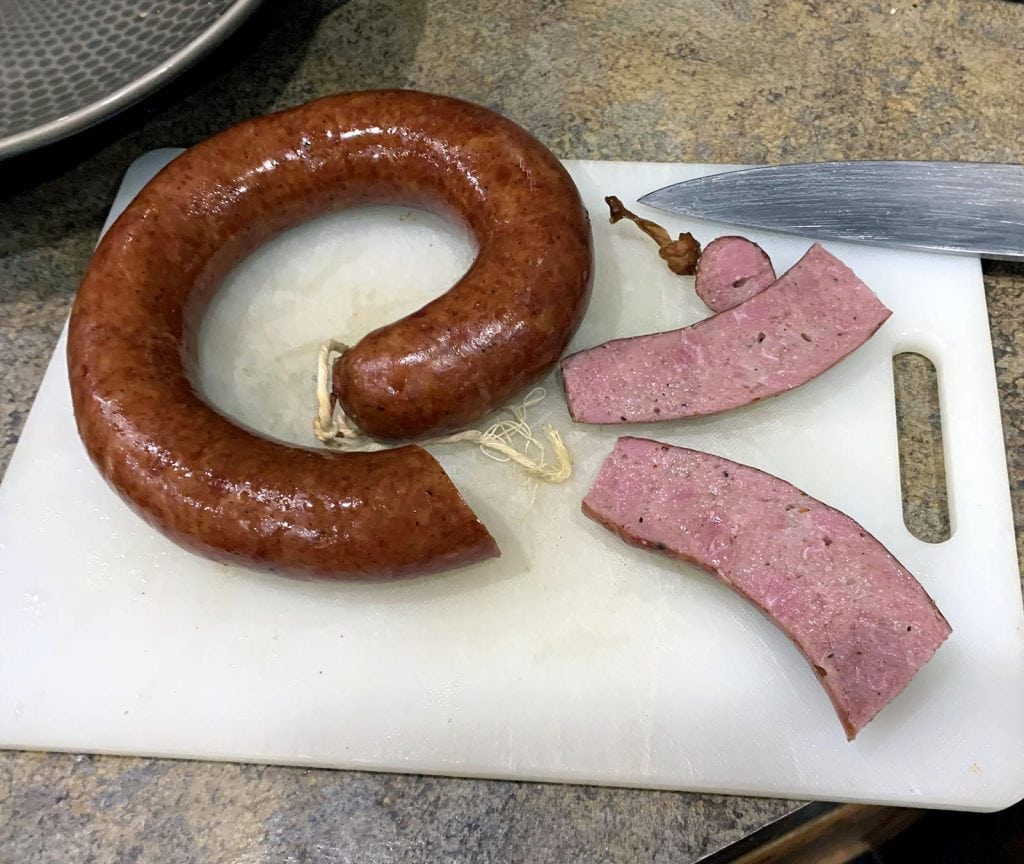 This is classic Elgin sausage—coarsely ground beef blended with pork shoulder and backfat for rich flavor. Credit: u/TidalWaveform via r/Charcuterie