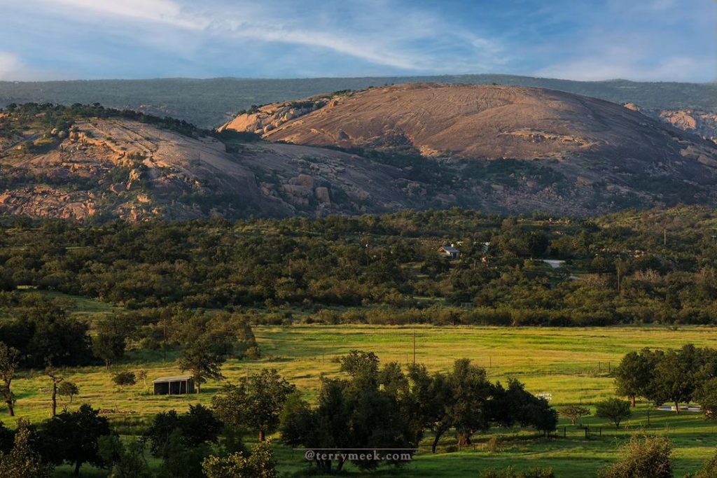 The sweeping views from Enchanted Rock State Natural Area are nothing short of breathtaking. Credit: @only.in.texas via Instagram