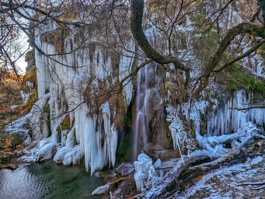 Gorman Falls takes on a surreal look in winter, with icy formations giving the waterfall an almost frozen magic. Credit: u/AdventuresWithBG via r/TXoutdoors