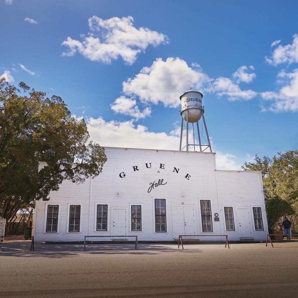 Gruene Hall’s iconic exterior, a cornerstone of Texas music history. Credit: @gruenehall via Instagram