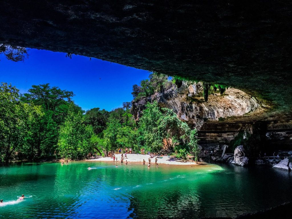 Hill Country gem, Hamilton Pool Reserve, draws visitors with its natural grotto and waterfall. Credit: @texashappens via Instagram