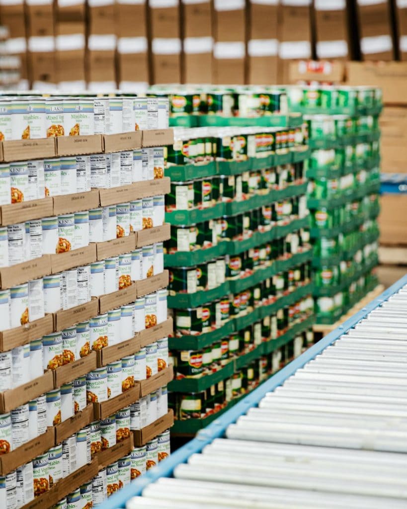 Canned goods and pantry staples are packed into senior food boxes by High Plains Food Bank—helping older adults access nutritious meals with dignity. Credit: @hpfoodbank via Instagram