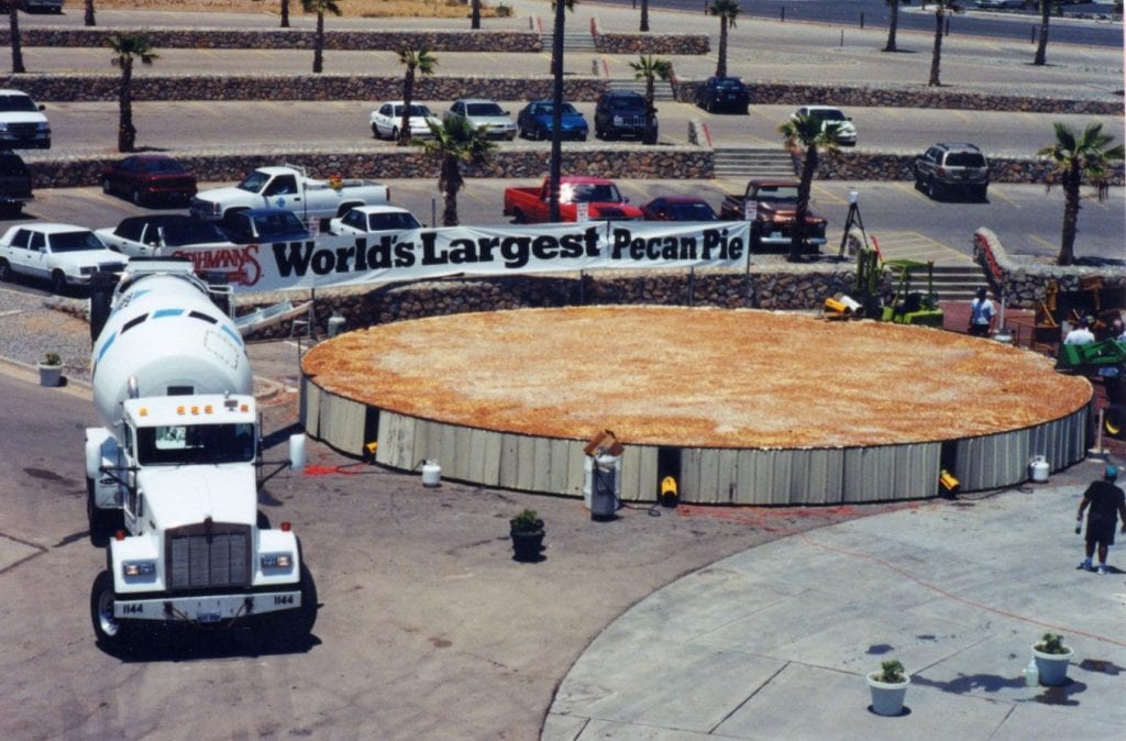 The world’s largest pecan pie — a colossal dessert baked by the El Paso Diablos Baseball Club in 1999 that weighed over 18.8 tonnes and stretched 50 feet across. Credit: @GWR via X