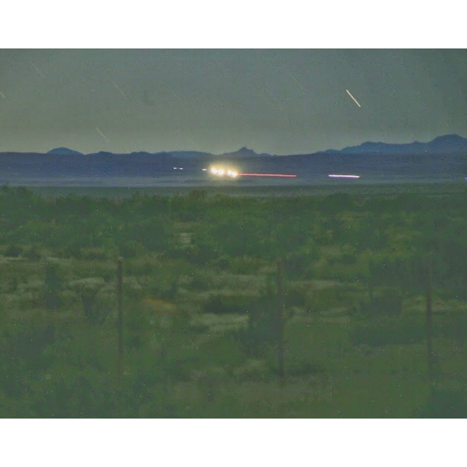 The mysterious Marfa Lights appear on the horizon, glowing against the dark West Texas night. Credit: @cibolocreekranch via Instagram