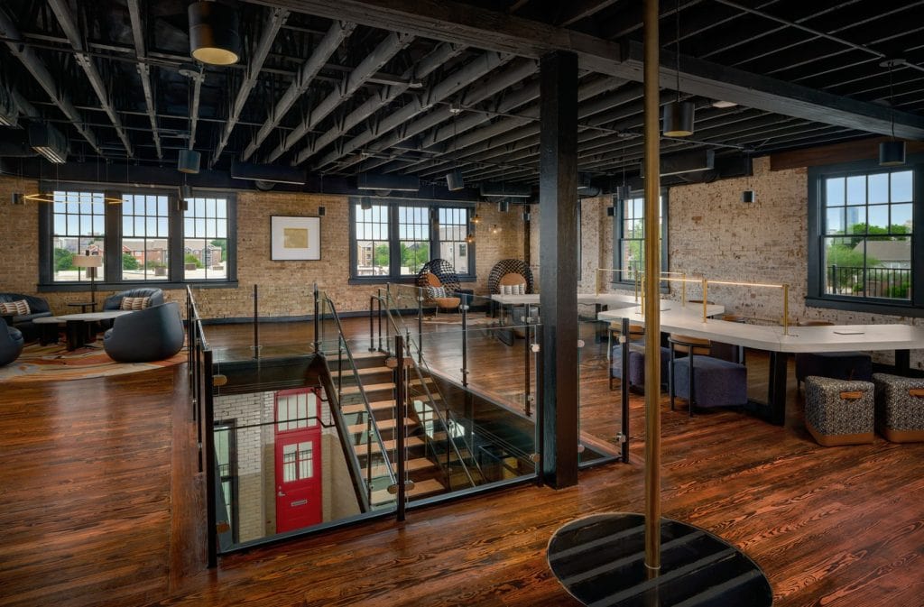 The activity center at the Nobleman Hotel features the original fireman’s pole, preserved from its firehouse days. Credit: @thenoblemanhotel via Instagram