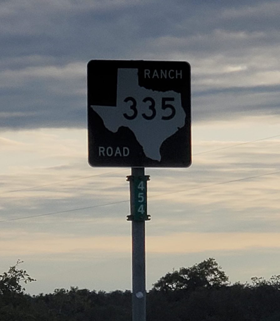Road sign for Ranch Road 335, a beloved stretch for scenic drives and motorcycle tours. Credit: Danijela Miškić via Facebook