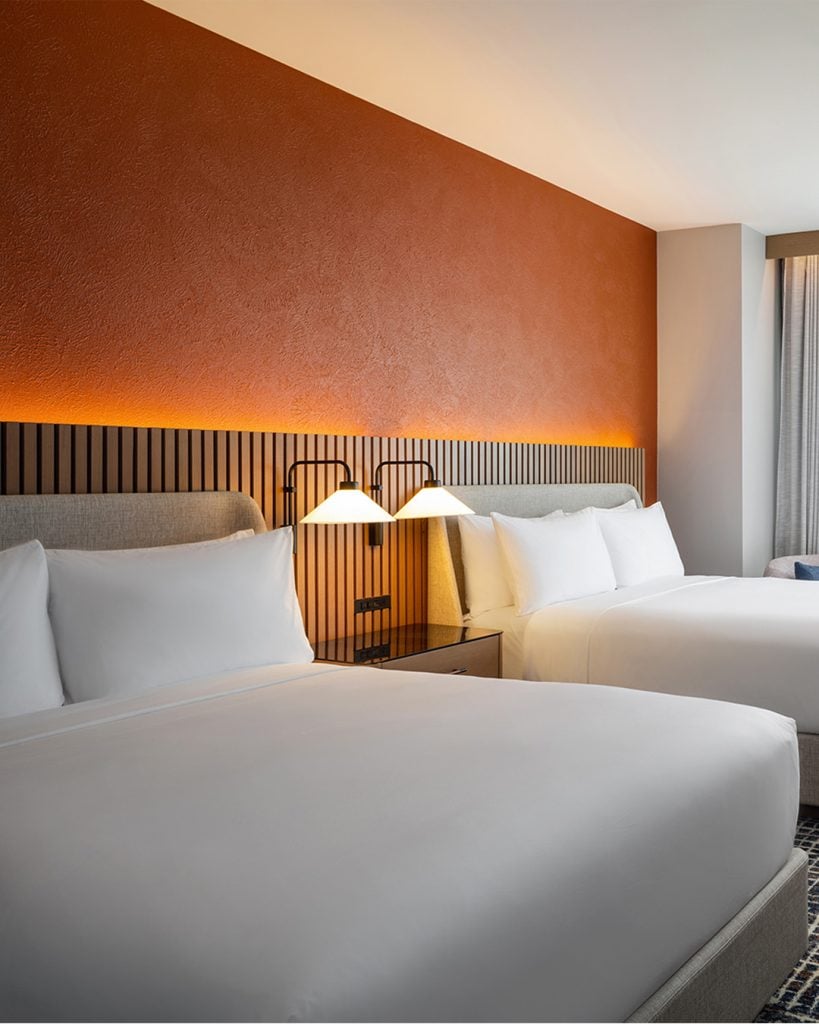 Huge beds, spotless linens, and plenty of space make this room at The Nobleman Hotel a perfect retreat. Credit: @thenoblemanhotel via Instagram