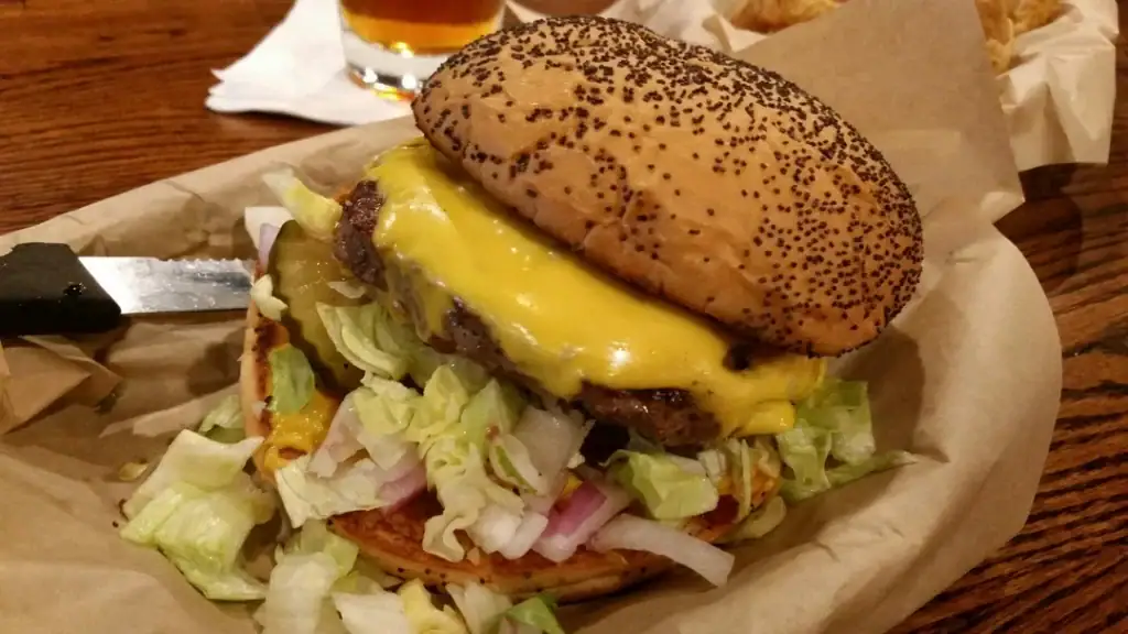 A beloved classic cheeseburger at Snuffer's, made better with poppy-seed buns. Credit: u/jsmeeker via r/burgers