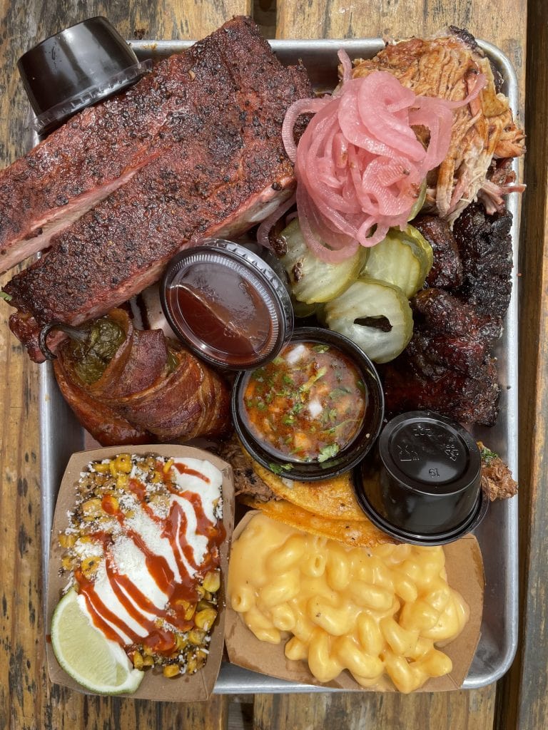 The whole Texas BBQ spread — slow-smoked meats, hearty sides, and all the fixings. Credit: u/thirdeye11 via r/food