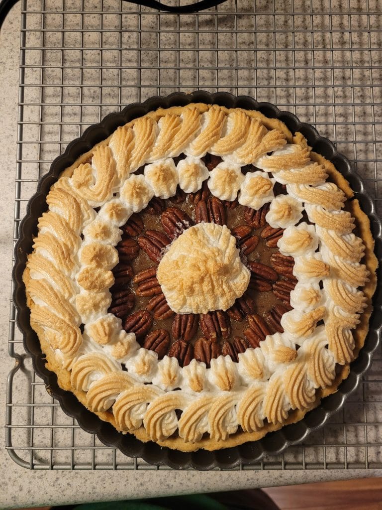 Texas pecan pie, loaded with toasted pecans and gooey filling. Credit: u/FayeQueen via r/TastingHistory