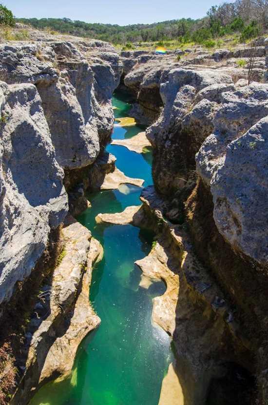 The Narrows, a scenic stretch of the Blanco River perfect for kayaking. Credit: u/PegLegWard via r/texas