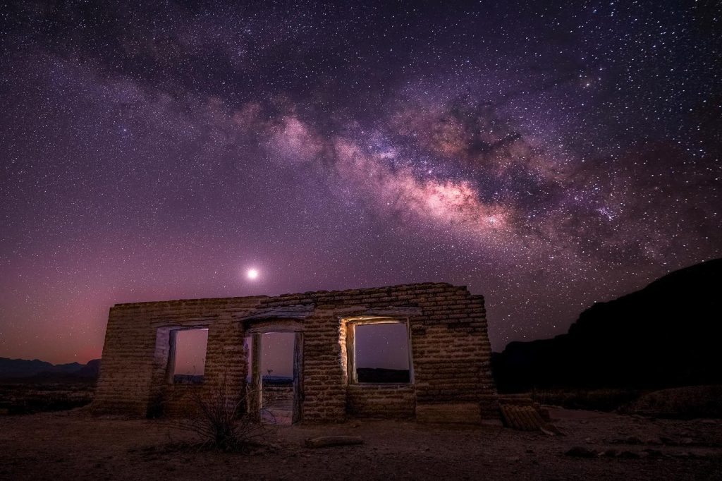 Stargazing at Big Bend National Park with the Milky Way glowing above the historic Dorgan House—an unforgettable dark-sky experience. Credit: @j4skies via Instagram