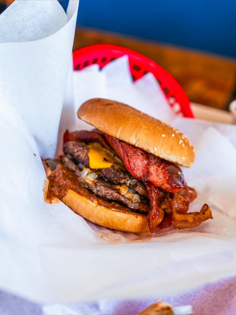 Can’t decide between a hot dog and a burger? Burger House solves the problem with their legendary Hamburggdog. Credit: @burgerhouseinc via Instagram