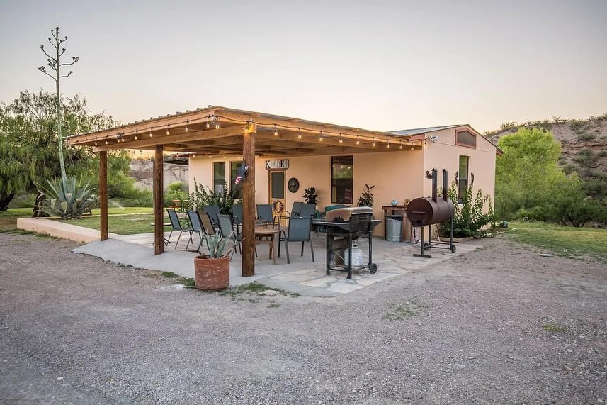 The communal kitchen with indoor and outdoor patio dining and BBQ grill—great for meals under the desert sky. Credit: @chinatihotsprings via Instagram