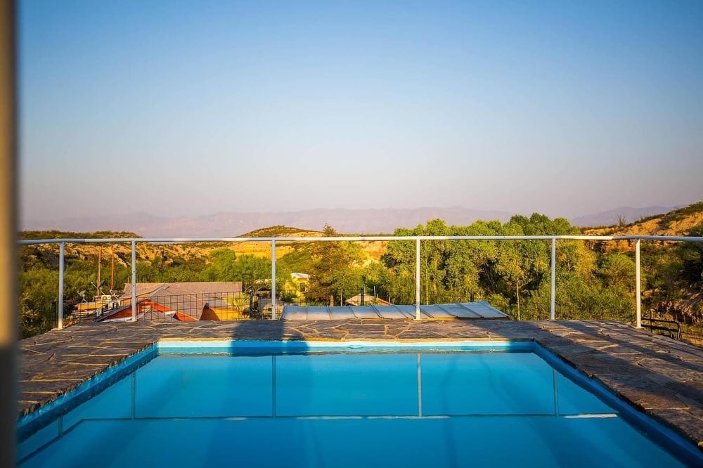 Aside from the hot tub, Chinati also has a pool to cool off while still enjoying the desert scenery. Credit: @chinatihotsprings via Instagram