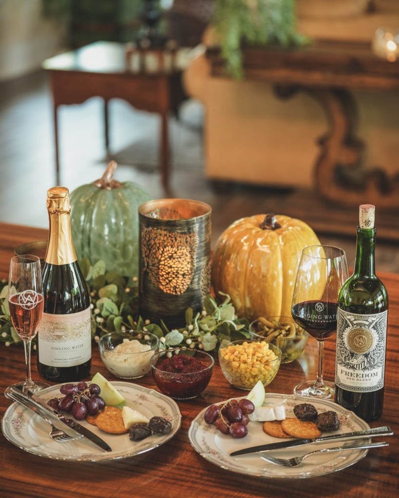 A grazing spread paired with wines from Singing Water Vineyards—one of Comfort’s three well-known vineyards and a must-visit for wine lovers. Credit: @singingwatervineyards via Instagram