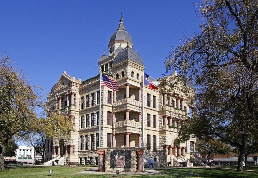 The Denton County Courthouse-on-the-Square is an iconic centerpiece surrounded by shops, culture, and community life. Credit: @txhistcomm via Instagram