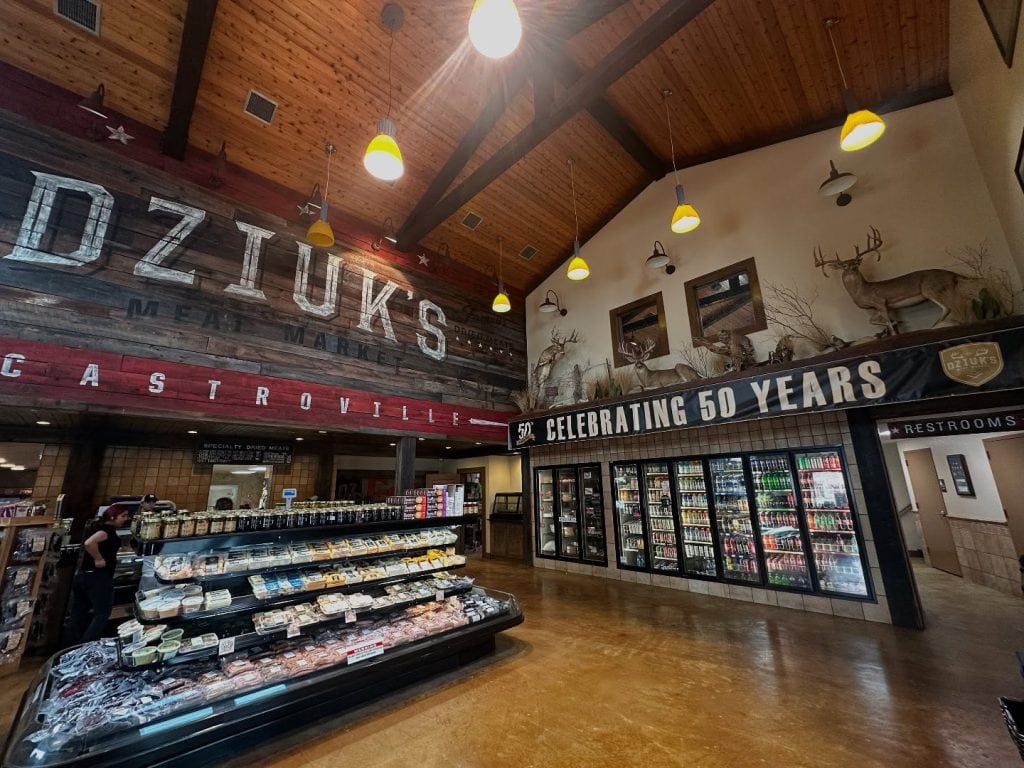 Inside Dziuk’s Meat Market, celebrating 50 years in 2025—rustic décor, heritage vibes, and mounted deer that add to its old-school Texas character. Credit: @dziuks via Instagram