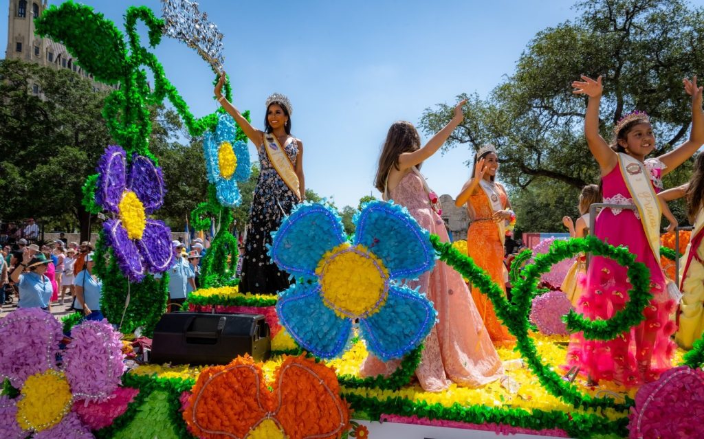 The Battle of Flowers Parade during Fiesta San Antonio features massive, colorful floral floats and holds the distinction of being the only parade in the U.S. produced entirely by women volunteers. Credit: @fiestasa via Instagram