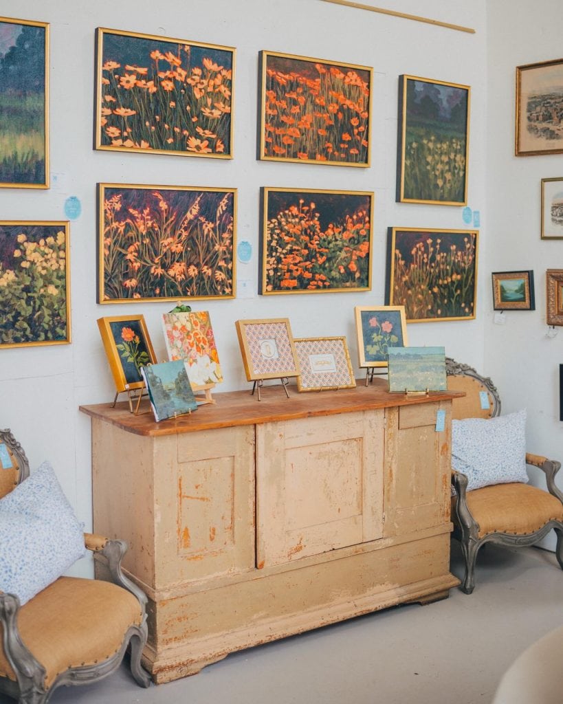 Paintings and vintage décor at Round Top Antiques Fair — from art and pillows to dishes, sofas, and cabinets, this antique lover’s paradise has endless one-of-a-kind pieces. Credit: @roundtopantiques