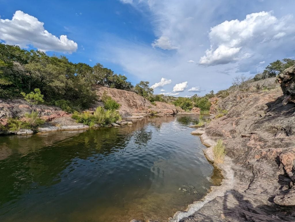 Gentle stream waters at Inks Lake provide the perfect setting for a peaceful kayak adventure. Credit: Vianney RIOTTE