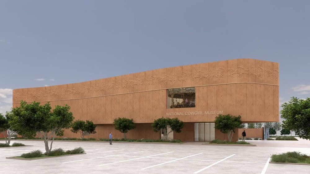 The façade of the National Cowgirl Museum and Hall of Fame greets visitors with a trompe l’oeil mural of cowgirls galloping toward them. Credit: National Cowgirl Museum & Hall of Fame