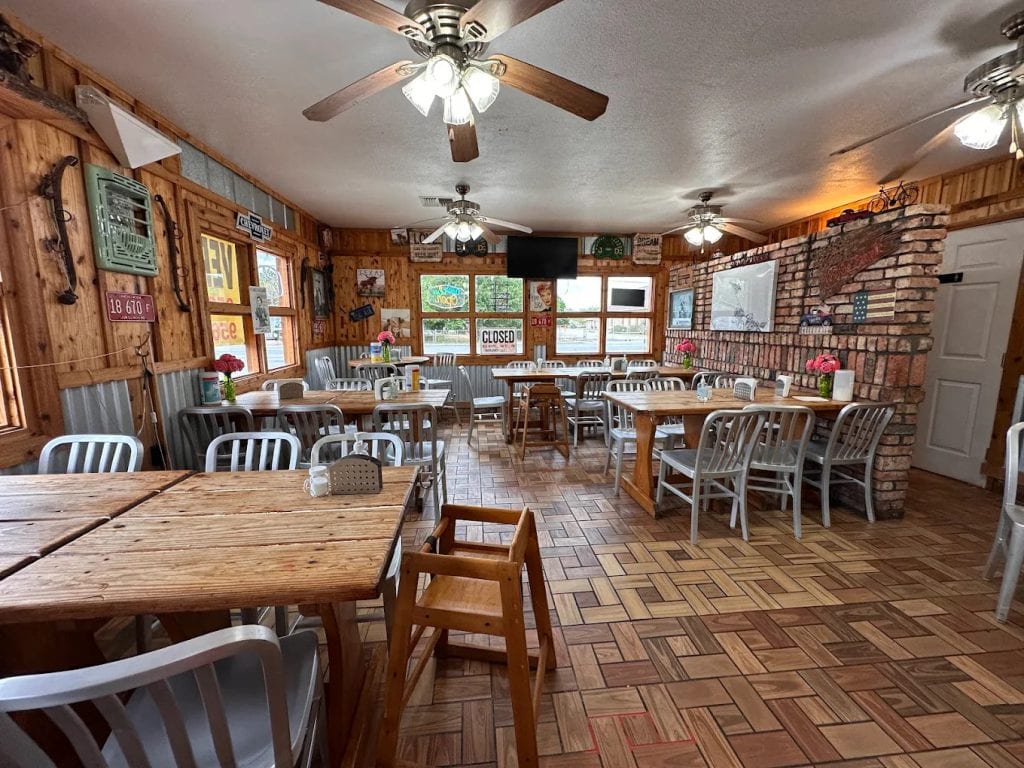 Inside Vera’s Backyard Bar-B-Que, the humble wooden interior and limited seating create an old-school, authentic vibe. Credit: Kitty