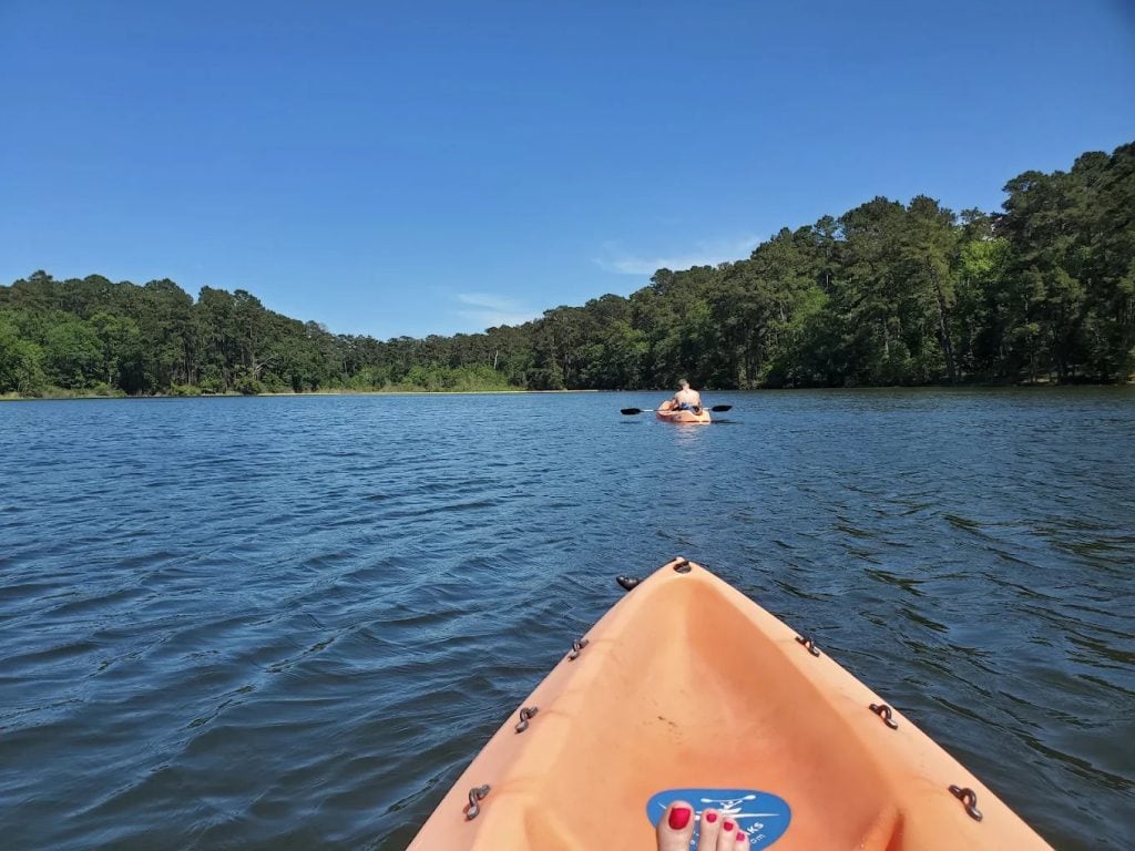 Kayaking across Lake Raven lets visitors glide through serene waters surrounded by nature. Credit: Misty Baldwin
