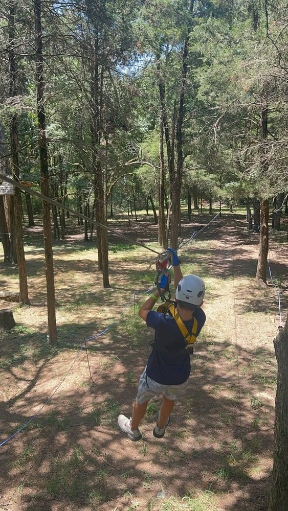 One of the park’s zip lines lets guests soar through the forest canopy for an unforgettable ride. Credit: Shauna B.