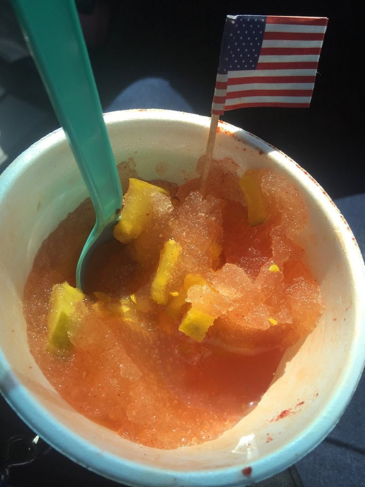 The Pickle Piccadilly, topped with chopped pickle and Chamoy, is one of Bahama Buck’s bold and unique creations. Credit: Lalie C.