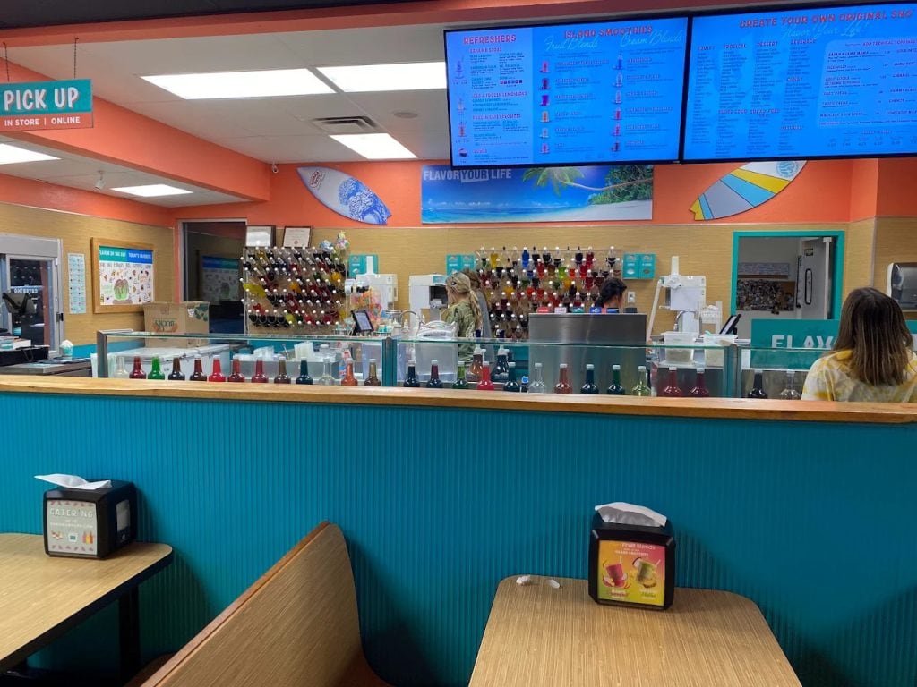 Inside, the bright and inviting space showcases tons of flavorings and menu options, with spacious tables for guests. Credit: Md Mezbah Uddin